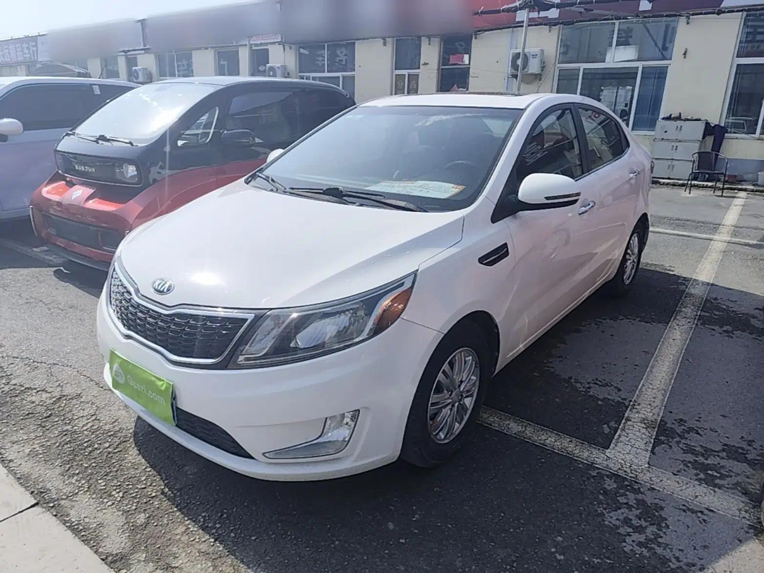 Kia K2 2012 Sedan 1.4L AT TOP Anniversary Edition — миниатюра 1