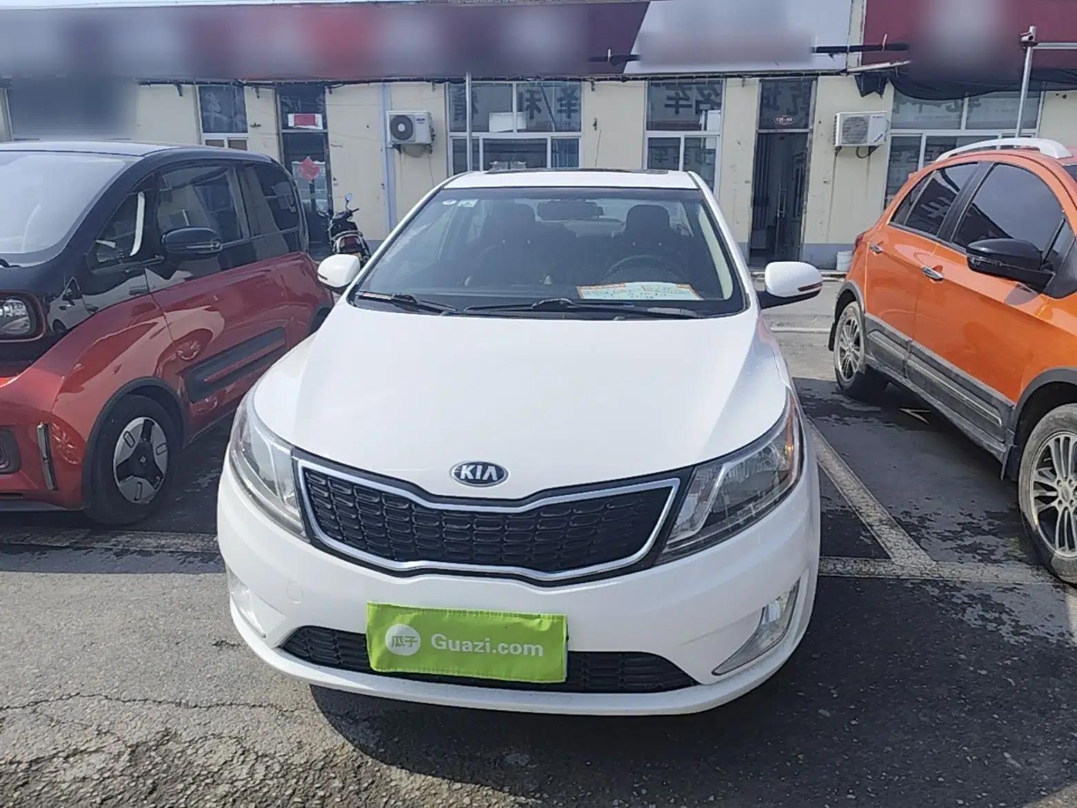 Kia K2 2012 Sedan 1.4L AT TOP Anniversary Edition — миниатюра 2