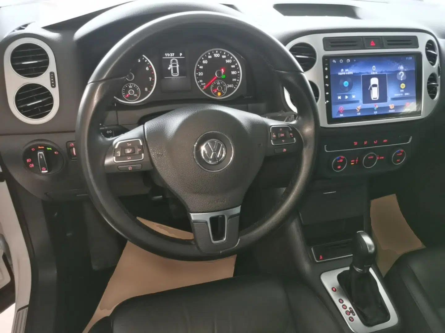 Volkswagen Tiguan 2015 1.8TSI Automatic Two-Wheel Drive Comfort Edition — миниатюра 14