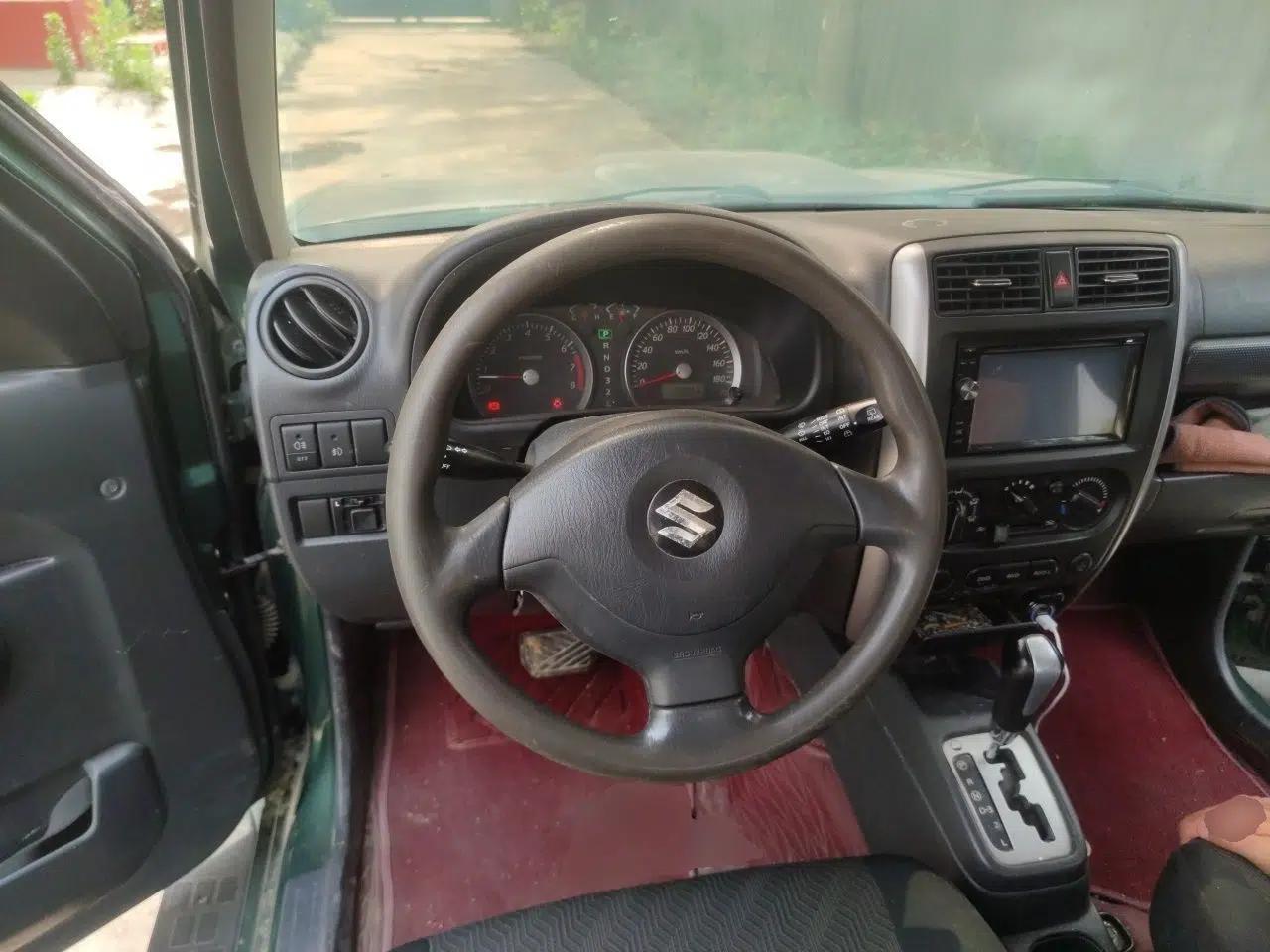 Suzuki Jimny 2012 1.3 AT JLX Navigation Edition — миниатюра 10