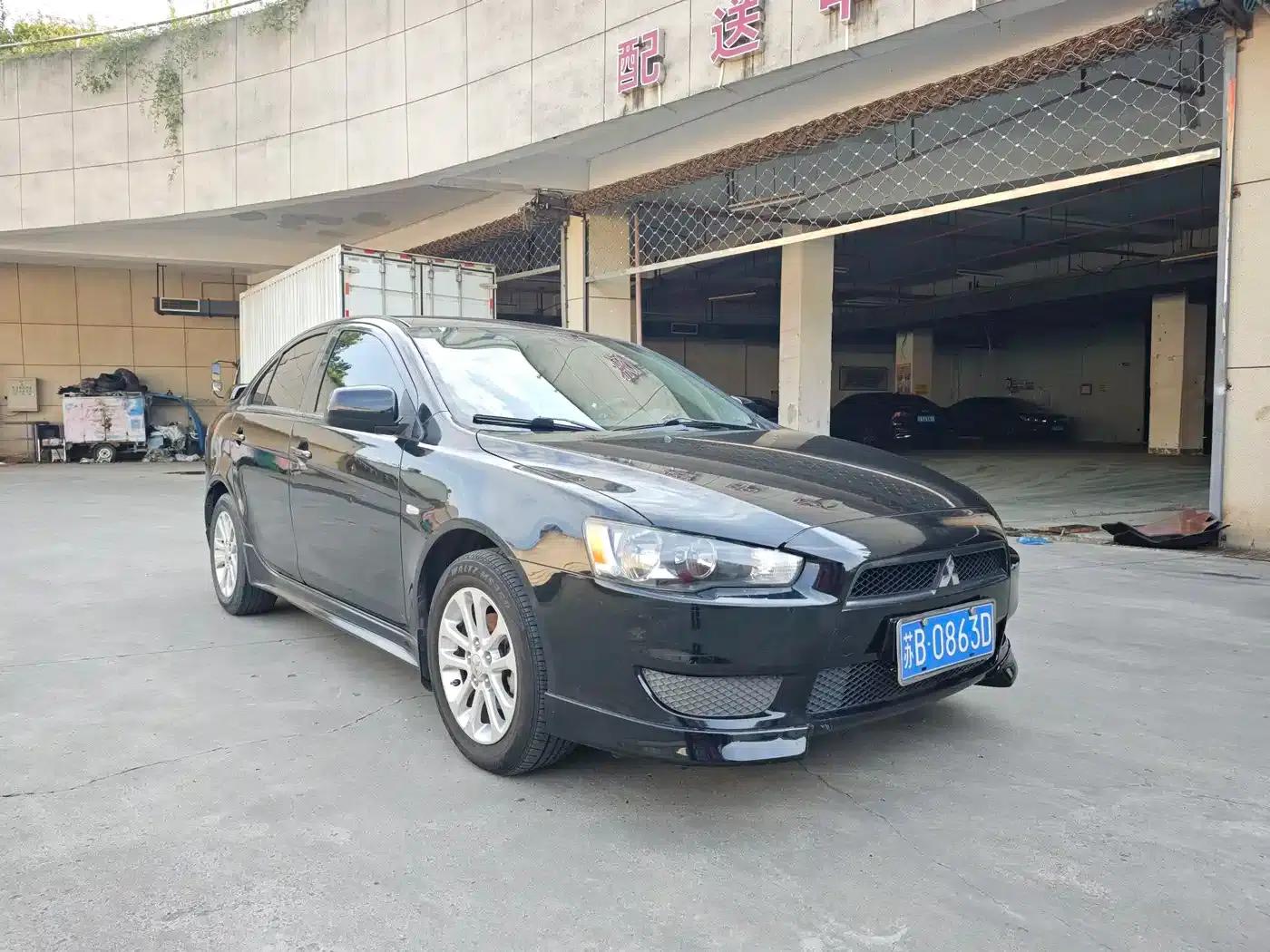Lancer EX 2011 Yaris L 2.0L Manual Comfort Edition — миниатюра 3