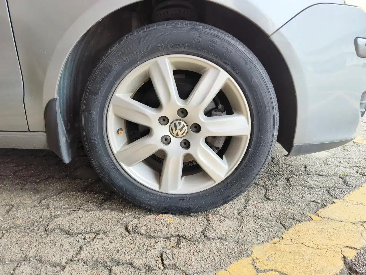 Volkswagen Polo 2009 Jingqu 1.4L Automatic Elegant Edition — миниатюра 8
