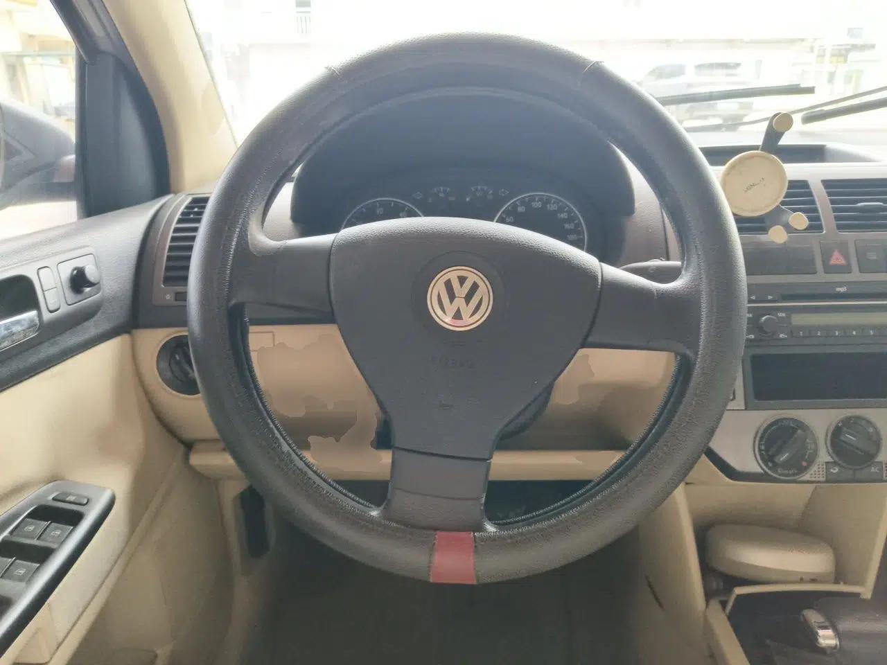Volkswagen Polo 2009 Jingqu 1.4L Automatic Elegant Edition — миниатюра 10