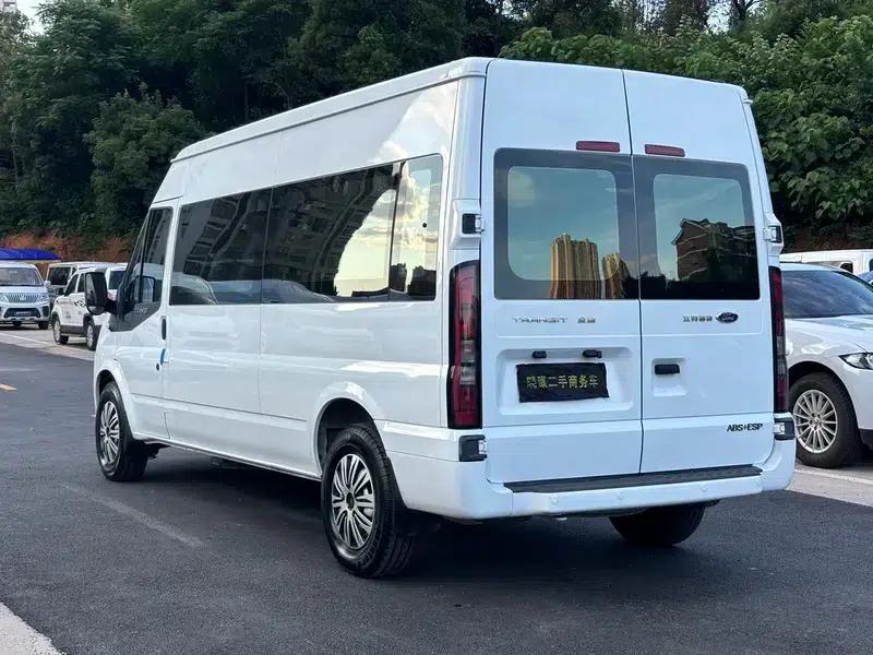 The new generation Ford Transit 2021 Pro 2.2T automatic luxury bus with long wheelbase, mechanical steps, 9 seats, and a mid-roof. — миниатюра 3
