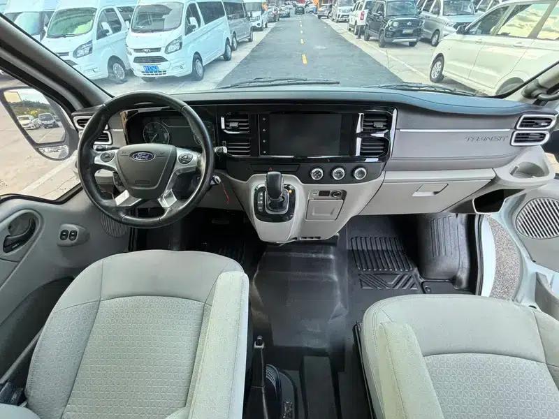 The new generation Ford Transit 2021 Pro 2.2T automatic luxury bus with long wheelbase, mechanical steps, 9 seats, and a mid-roof. — миниатюра 8