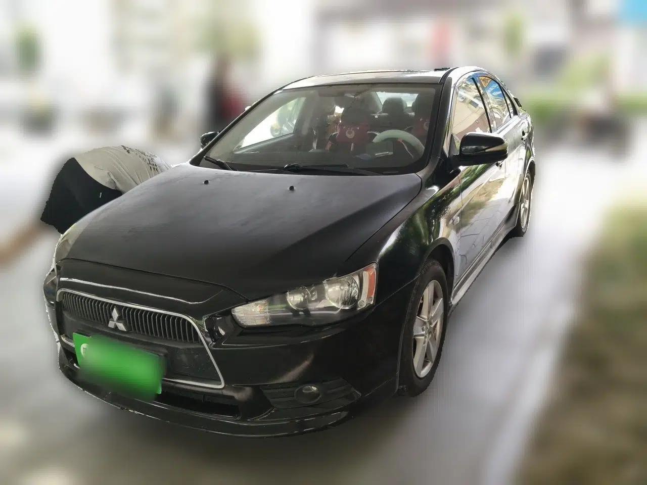 Mitsubishi Lancer EX 2010 ZhiShang Edition 1.8L CVT Luxury Model — миниатюра 1
