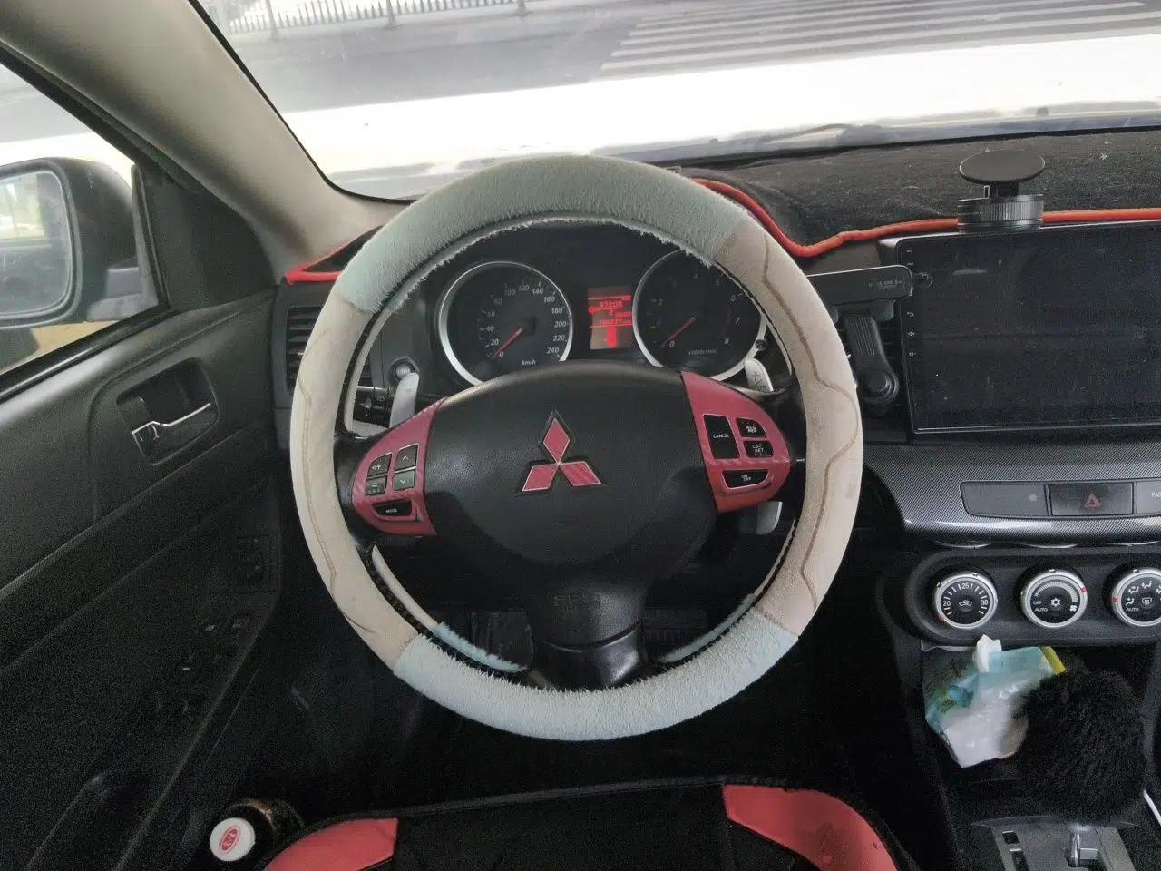 Mitsubishi Lancer EX 2010 ZhiShang Edition 1.8L CVT Luxury Model — миниатюра 10